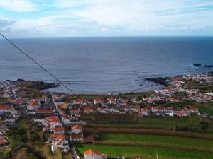 an aerial view of a town next to the ocean at Casa Dos Mosteiros in Mosteiros