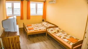 Postel nebo postele na pokoji v ubytování Penzion s restaurací na Furhaple