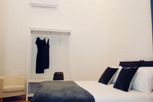 Posteľ alebo postele v izbe v ubytovaní CLUVERIO11 LUXURY APARTMENT