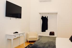 Televízia a/alebo spoločenská miestnosť v ubytovaní CLUVERIO11 LUXURY APARTMENT