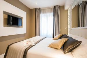 Residenza Venti Settembre客房内的一张或多张床位