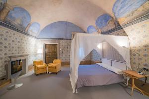 Postel nebo postele na pokoji v ubytování Hotel Cavour Et Des Officiers