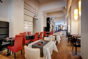 A seating area at Dharma Luxury Hotel