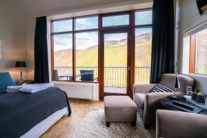 Ліжко або ліжка в номері Frost and Fire Hotel