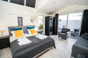 Ліжко або ліжка в номері Frost and Fire Hotel