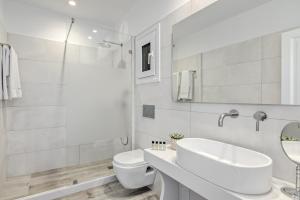 Um banheiro em Hotel Alkyon