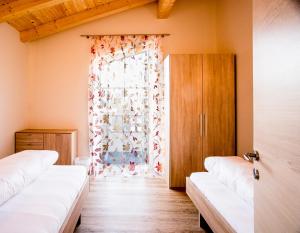 Postel nebo postele na pokoji v ubytování Breitenhof - Haus Breiten