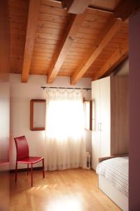 A bed or beds in a room at CASA GIULIA a Borso del Grappa