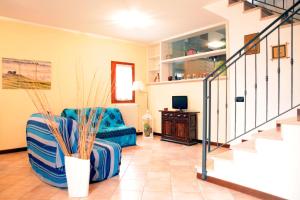 A television and/or entertainment centre at CASA GIULIA a Borso del Grappa