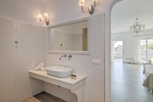 Um banheiro em Hotel Alkyon