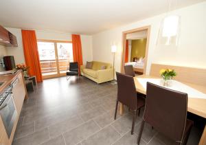 Kuchyň nebo kuchyňský kout v ubytování Apartment Bergsonne