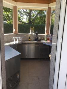 A kitchen or kitchenette at Villa Elena