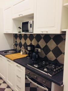 Kuchyňa alebo kuchynka v ubytovaní CLUVERIO11 LUXURY APARTMENT
