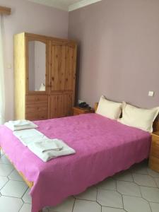 A bed or beds in a room at Villa Elena