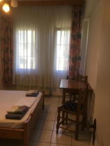 A bed or beds in a room at Villa Elena