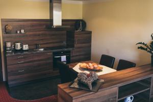Kuchyňa alebo kuchynka v ubytovaní Appartement Sport Girbl