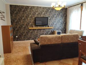 TV a/nebo společenská místnost v ubytování Casa Hormazas