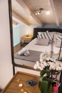 A bed or beds in a room at Lefkas Villas