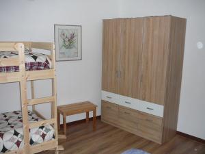 Postel nebo postele na pokoji v ubytování Casa Screm - Appartamenti e Camere -Rigolato - UD