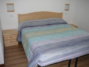 Postel nebo postele na pokoji v ubytování Casa Screm - Appartamenti e Camere -Rigolato - UD