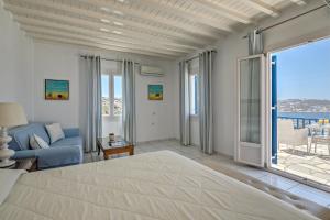 Cama ou camas em um quarto em Hotel Alkyon