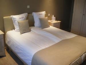 Letto o letti in una camera di Hotel Amaryllis