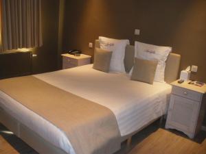 Letto o letti in una camera di Hotel Amaryllis