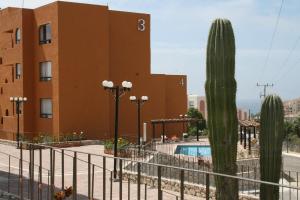Bazén v ubytování Sunrock Hotel & Suites nebo v jeho okolí