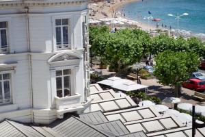 an aerial view of a building and a beach at Excelsior in Saint-Raphaël