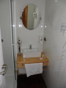 Koupelna v ubytování Dein Haus Hotel y Departamentos + 37 fotografií