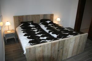 Postel nebo postele na pokoji v ubytování Lekehalom Tiszameer + 58 fotografií