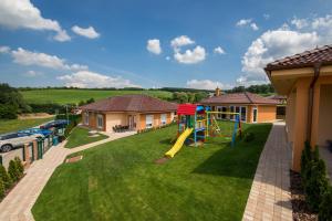 Herní místnost nebo prostor pro děti v ubytování Villa Gracia Podhájska