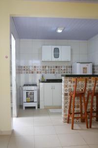 A cozinha ou cozinha compacta de Pousada Chalés do Toque