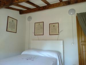 Postel nebo postele na pokoji v ubytování Baduerughe - ValledelLago