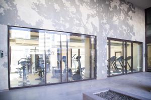 The fitness centre and/or fitness facilities at Luxury apt in Moscova (Gym+parking+private office)