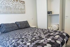 เตียงในห้องที่ New flat fully furnished in P.ta Romana