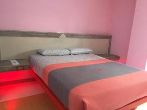 Ένα ή περισσότερα κρεβάτια σε δωμάτιο στο Hotel H - Arena Adults Only
