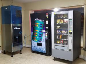 two vending machines are next to each other at America's Value Inn in Tulsa