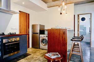Кухня или мини-кухня в Rambutan Resort – Siem Reap
