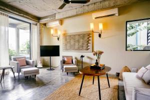 Телевизор и/или развлекательный центр в Rambutan Resort – Siem Reap