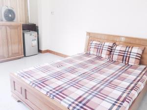 Postel nebo postele na pokoji v ubytování Chang Homestay
