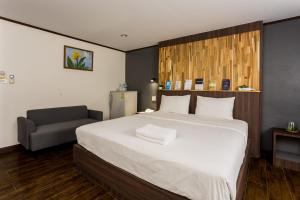 Letto o letti in una camera di Phimai Paradise Boutique Hotel