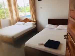 Krevet ili kreveti u jedinici u okviru objekta Hotel Tobiko