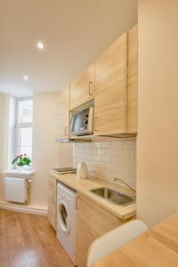 Køkken eller tekøkken på Suites by Riga Old Town