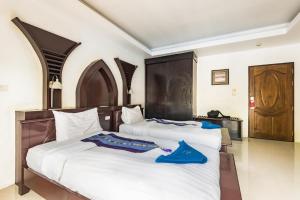 Postel nebo postele na pokoji v ubytování Koh Tao Regal Resort - SHA Plus