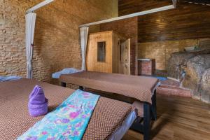 Postel nebo postele na pokoji v ubytování Koh Tao Regal Resort - SHA Plus