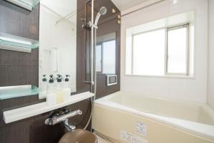 Ένα μπάνιο στο City Hotel Shinsaibashi Lofts +53 φωτογραφίες
