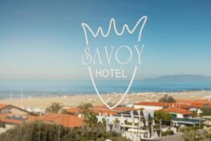 een bord voor het Walt Disney erehotel bij Savoy Hotel in Marina di Pietrasanta