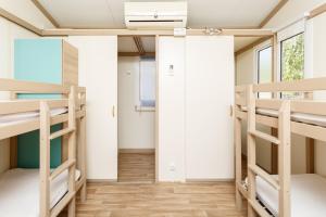 Postel nebo postele na pokoji v ubytování Camping la Sierrecilla