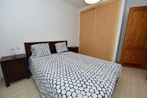 מיטה או מיטות בחדר ב-Ayita House